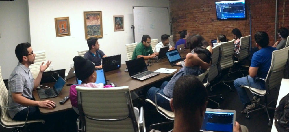  Jorge teaching new students to code at HQ Raleigh. 