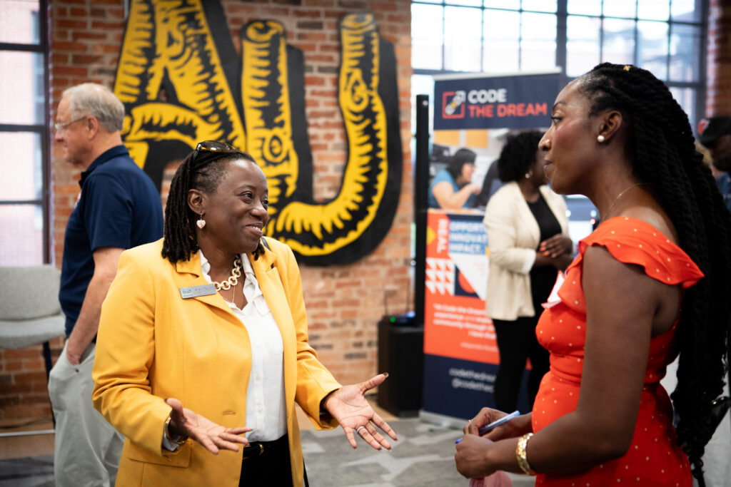 People socializing after Juneteenth event